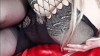 Susi is wearing black fishnet she is teasing with huge tits