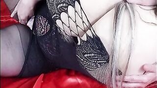 Susi is wearing black fishnet she is teasing with huge tits