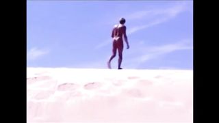 Tanned guy on beach in tiny string thong (temporarily!)