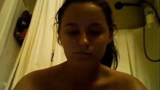 Girl beatsoff in bathroom