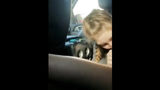 Blonde college girl with braids sucks cock in the car