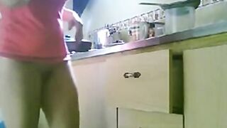 LATINA MATURE NUDE KITCHEN