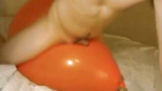 Big inflatable orange balloon humping cum